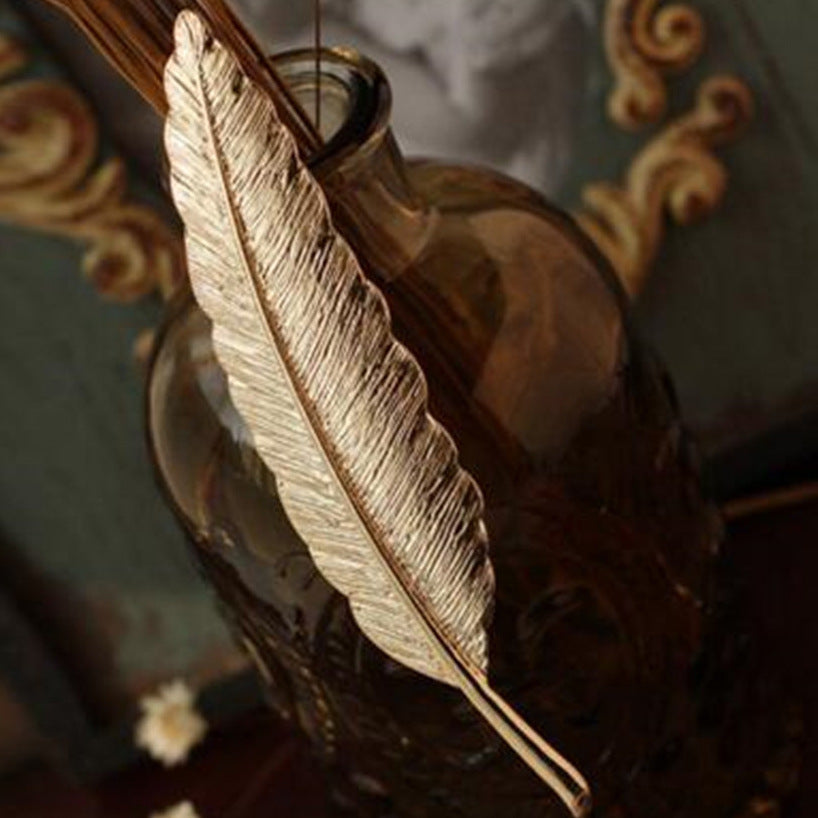 Metallic gold Feather Brooch for men - Nyaabs