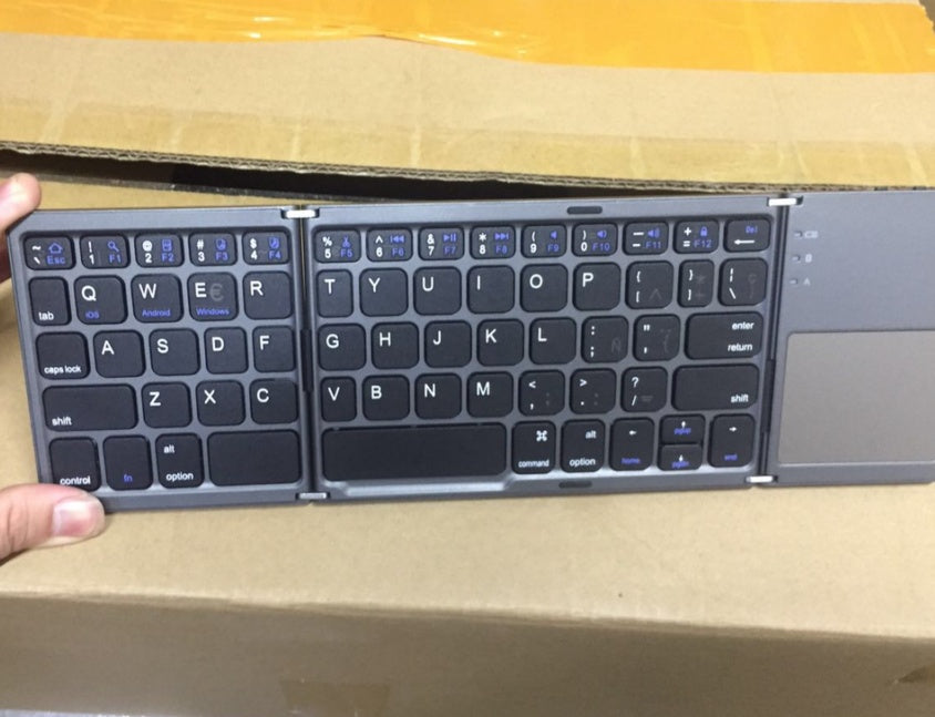 Ultra-thin Tri-fold Folding Touch Keyboard nyaabs.com